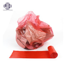 Disposable red drawstring bin liners trash bags